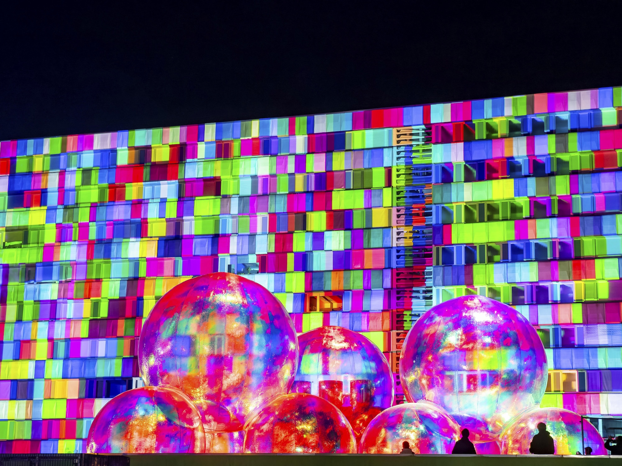 Karl Marx in pastel colors, churches in a flash of lights