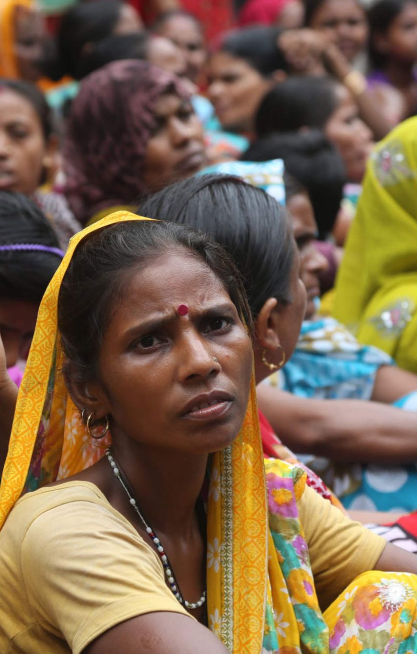 Arbeiterinnen in Indien protestieren für bessere Bedingungen. 
