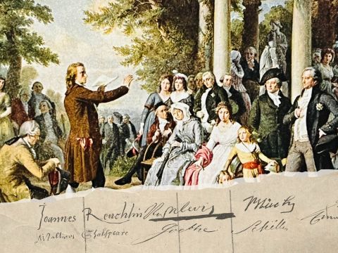 Goethe und Schiller beim Lesen und Diskutieren in einem Park in Weimar. Die Illustration stammt aus dem 19. Jahrhundert.