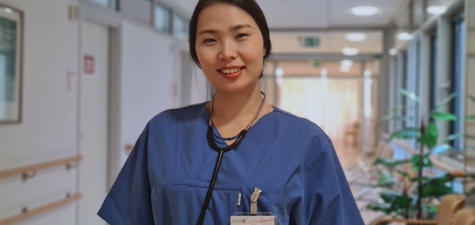 Kieu Oanh in her working clothes at Rostock University Medical Center Kieu Oanh in her working clothes at Rostock University Medical Center