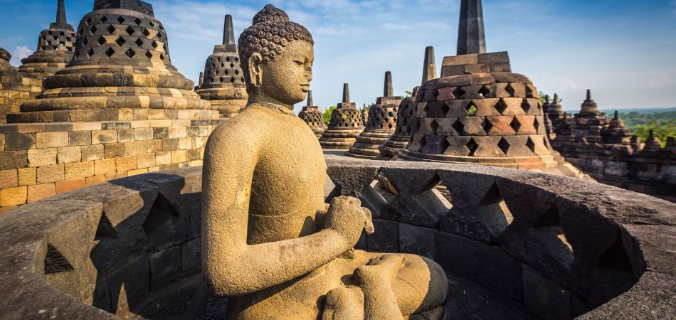 Buddha statue in Borobudur temple Buddha statue in Borobudur temple