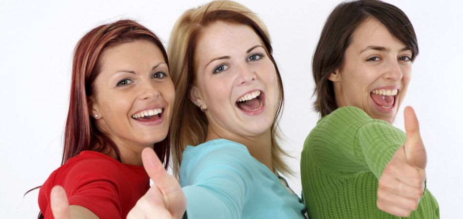 Three girls thumbs up Three girls thumbs up