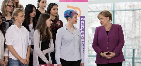 Merkel takes part in Girl's Day Merkel takes part in Girl's Day