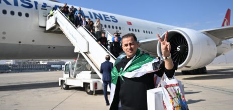 People arriving at the airport in Damascus