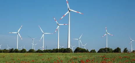 Modern wind turbines in a rural area in Germany