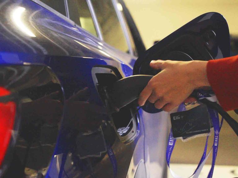 An electric car being “refuelled”