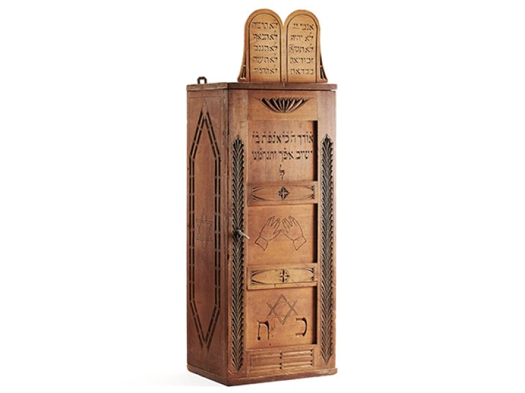 Homemade Torah shrine crafted by Leon Daniel Cohen from Hamburg that he took with him when he was deported to the Theresienstadt ghetto. When he was deported to Auschwitz in 1944, he left it behind in the care of Henrietta Blum, the director of a children’s home.
