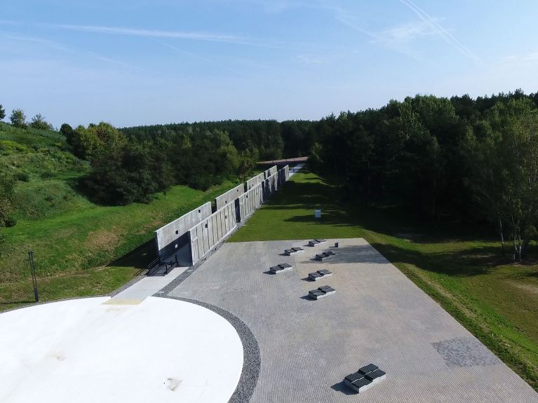 A drone photograph shows the representations of deportation rail trucks in Blagovshchina Forest. 