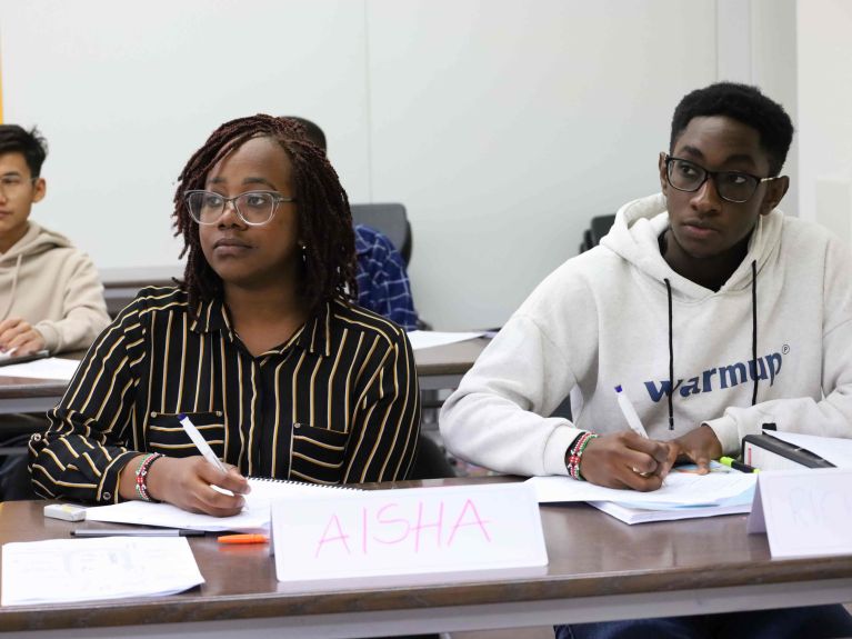 Aisha Mussa and Richard Gekonge attending a class in Germany