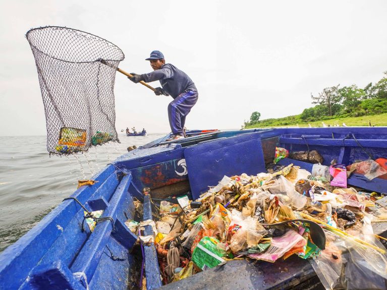 Barriers catch the plastic waste in the rivers. 