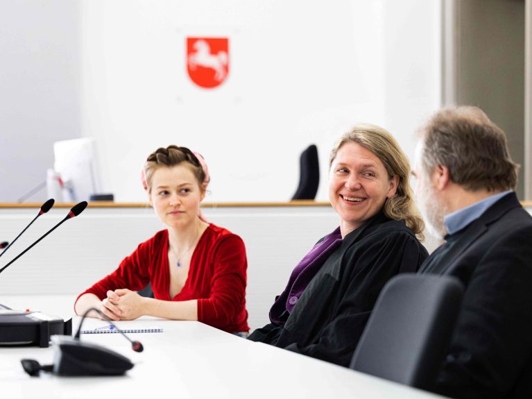 Roda Verheyen with a climate activist during a lawsuit against VW