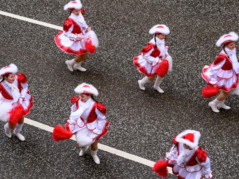 Funkemariechen are female dancers at the Rhineland carnival. They wear historic uniforms and lead the dance troupe with acrobatic routines.