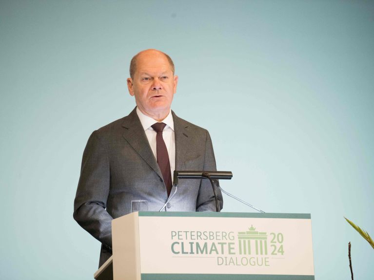 German Chancellor Olaf Scholz speaking at the Petersberg Climate Dialogue 