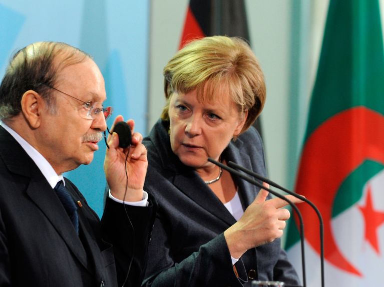 German Chancellor Angela Merkel and Algerian President Abdelaziz Bouteflika