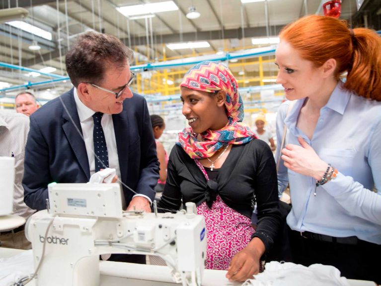 Minister of Economic Cooperation Gerd Müller in a modern textiles factory in Addis Ababa, Ethiopia