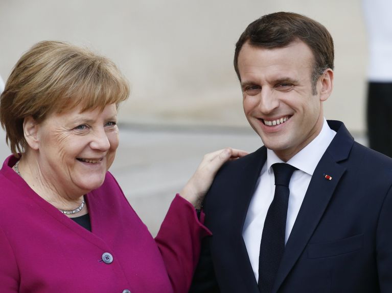 Angela Merkel and Emmanuel Macron