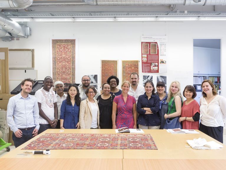 The international guests in the textile workshop