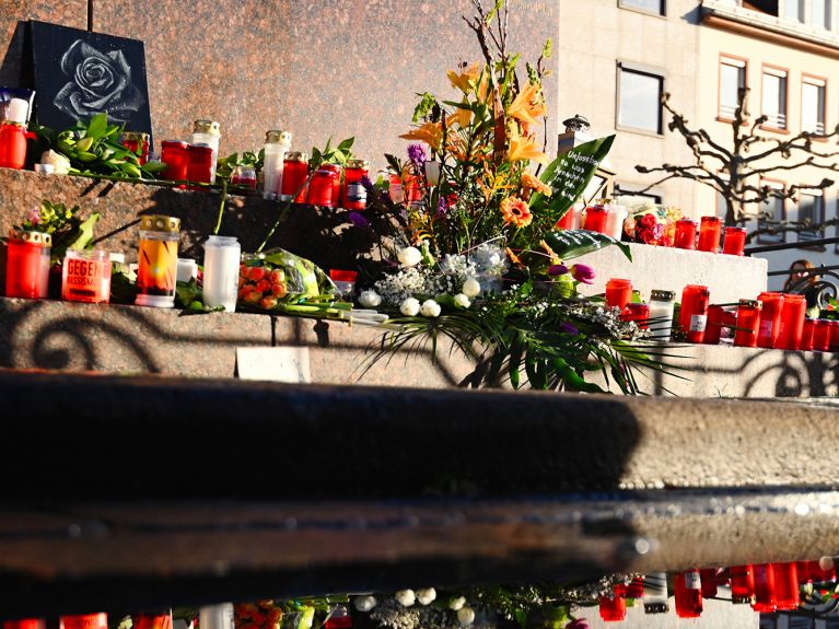 Flowers and candles at the market square in Hanau