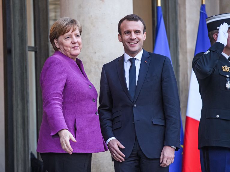 Angela Merkel and Emmanuel Macron