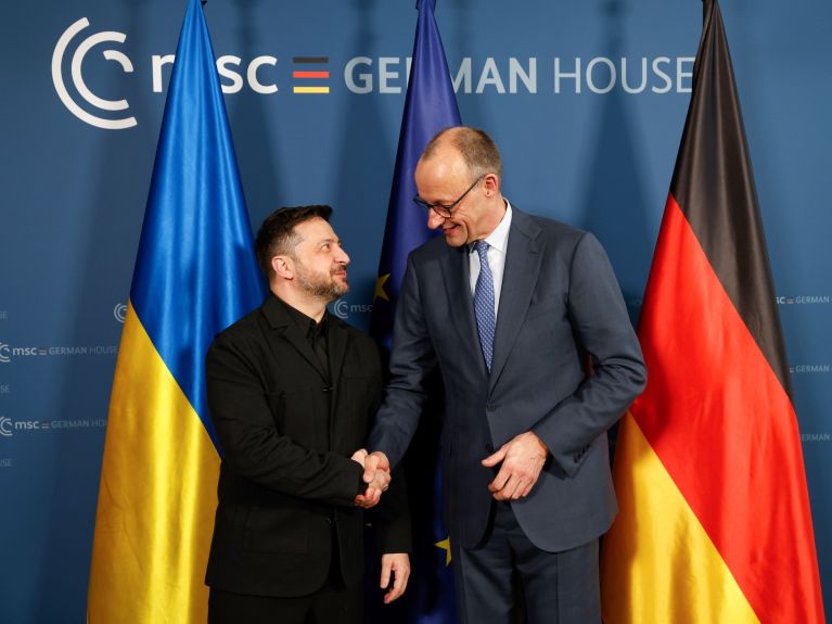Ukrainian President Volodymyr Zelenskiy (left) and Federal Chancellor Friedrich Merz at the 2026 Munich Security Conference.