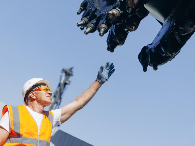 Mine workers with drilling equipment