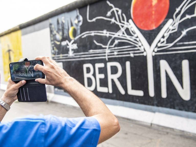 Heute ist die Mauer in Berlin eine Touristenattraktion.