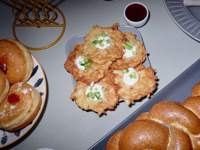 Latke, sufganiyah and challah: traditional foods that are an integral part of the Hanukkah festivities. 