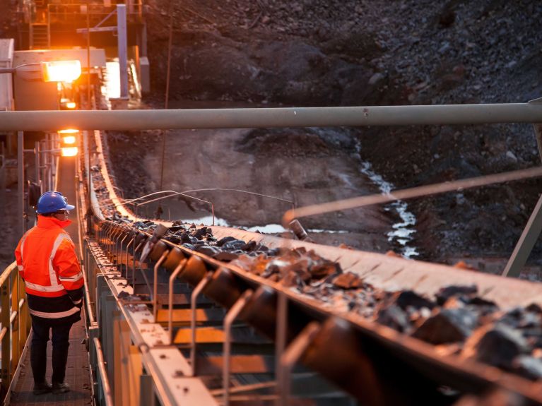 Workers at an ore mine in the Australian state of New South Wales