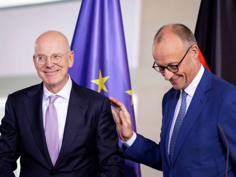 Martin Blessing (left) and Friedrich Merz