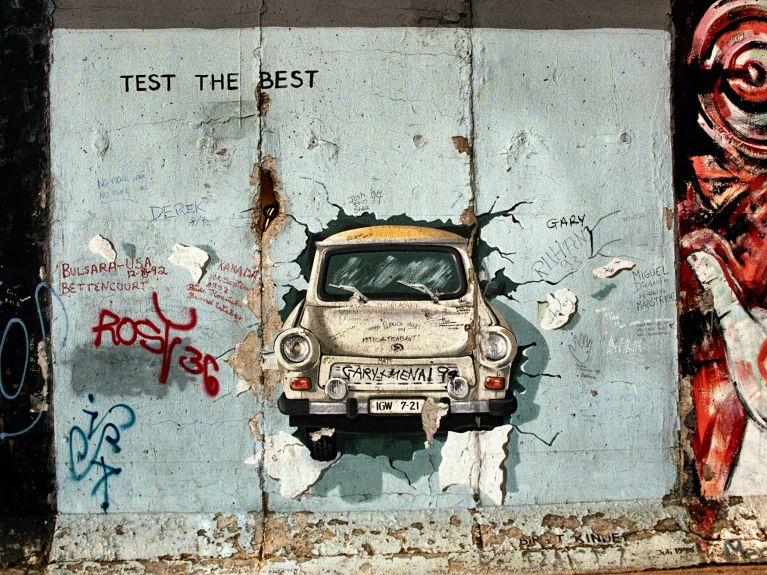 Painting by Birgit Kinder on the East side of the Berlin Wall. Painting by Birgit Kinder on the East side of the Berlin Wall.