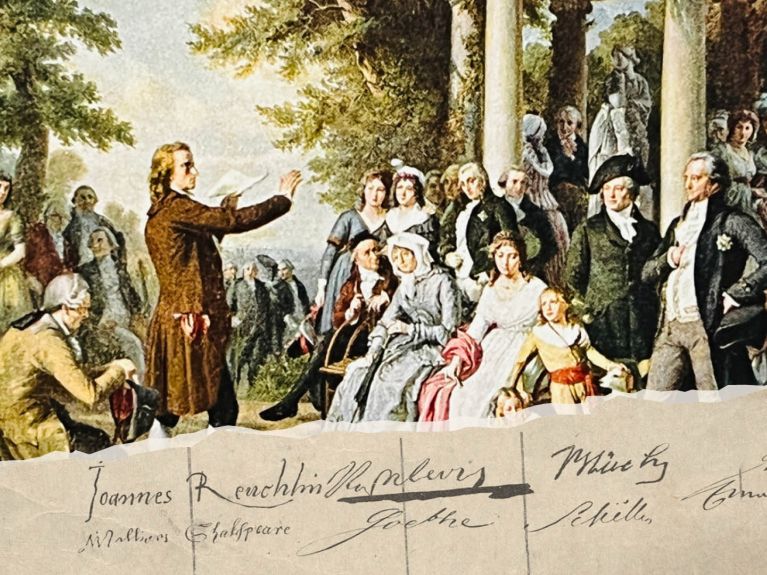 Goethe und Schiller beim Lesen und Diskutieren in einem Park in Weimar. Die Illustration stammt aus dem 19. Jahrhundert.