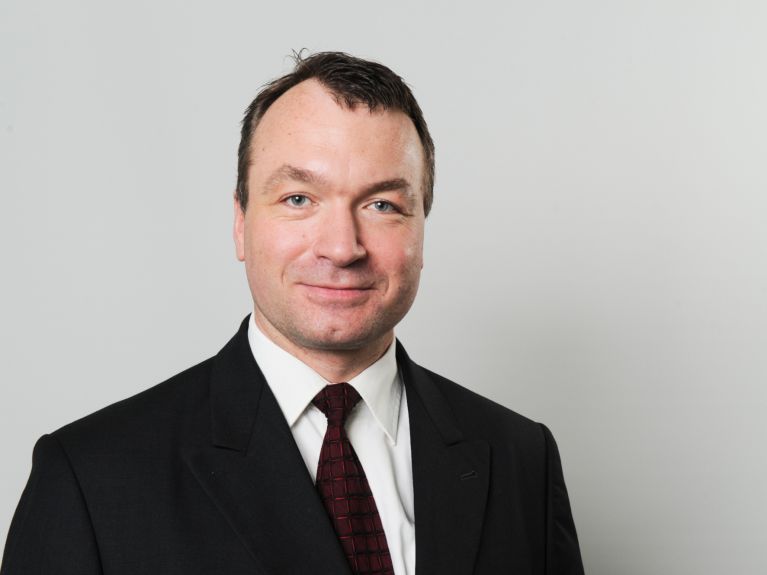 Portrait photo of Achim Hartig.