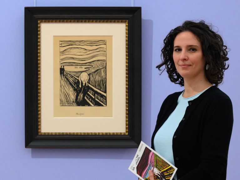 Florence Thurmes, General Director of Kunstsammlungen Chemnitz, next to “The Scream” by Edvard Munch 