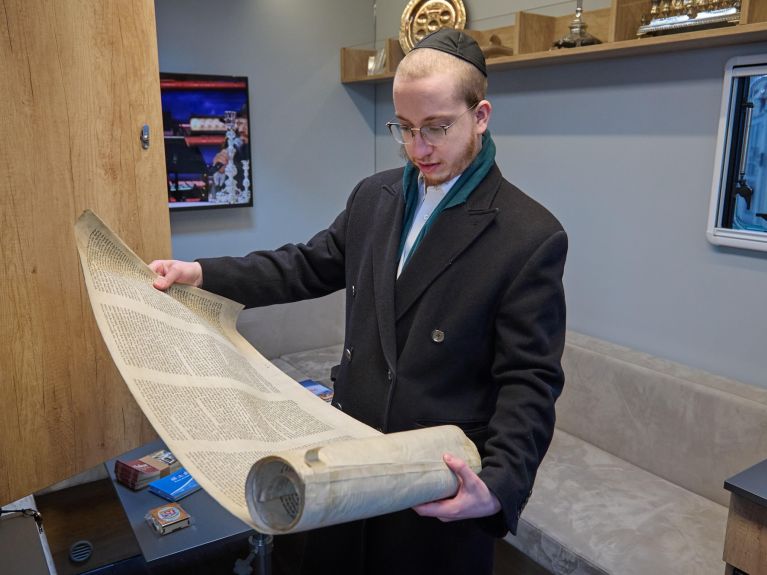 Rabbi Mendel Brandwine rides around Berlin with a mobile synagogue. 