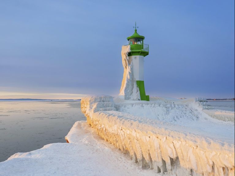 Ice encrusted lighthouse on the Baltic island of Rügen. 