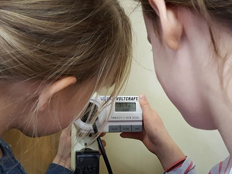 School students check energy consumption