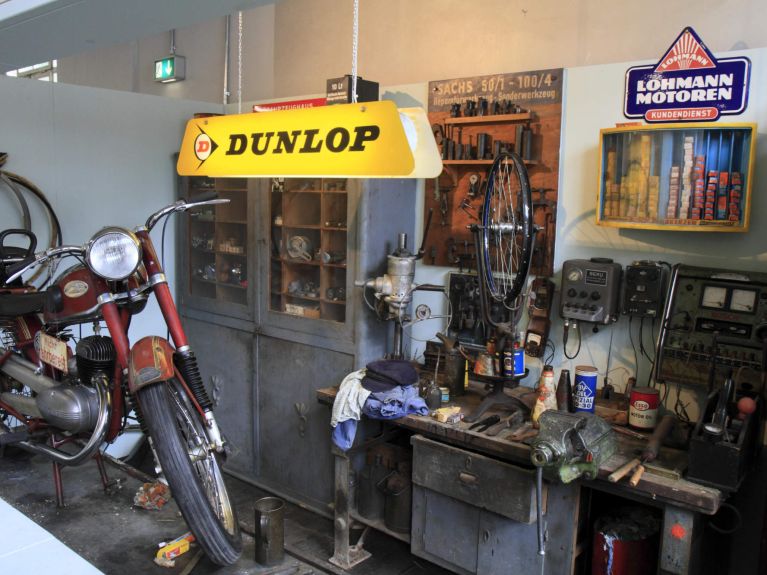 Historic motorcycle workshop at the car and clock museum in Schramberg Historic motorcycle workshop at the car and clock museum in Schramberg