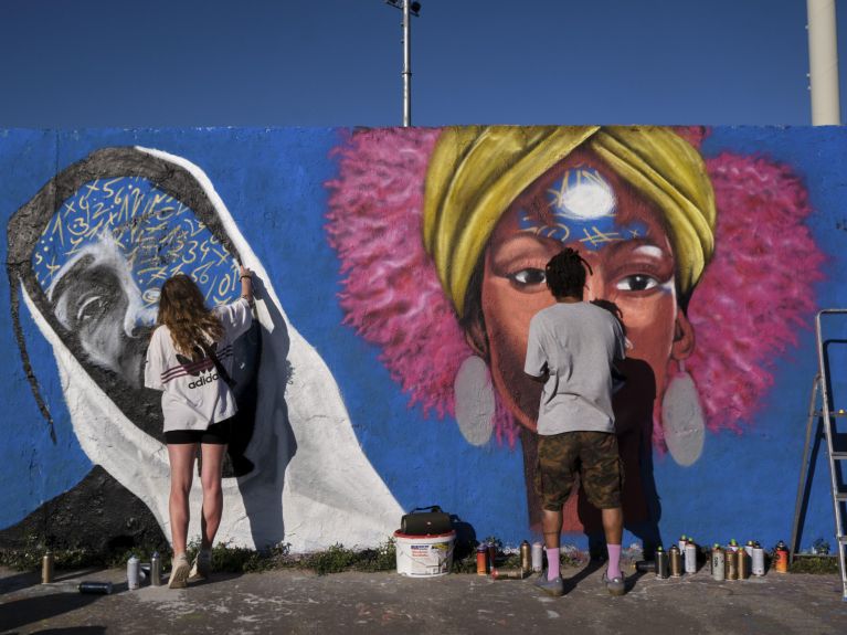 The former Berlin Wall becomes a canvass in Mauerpark. The former Berlin Wall becomes a canvass in Mauerpark.