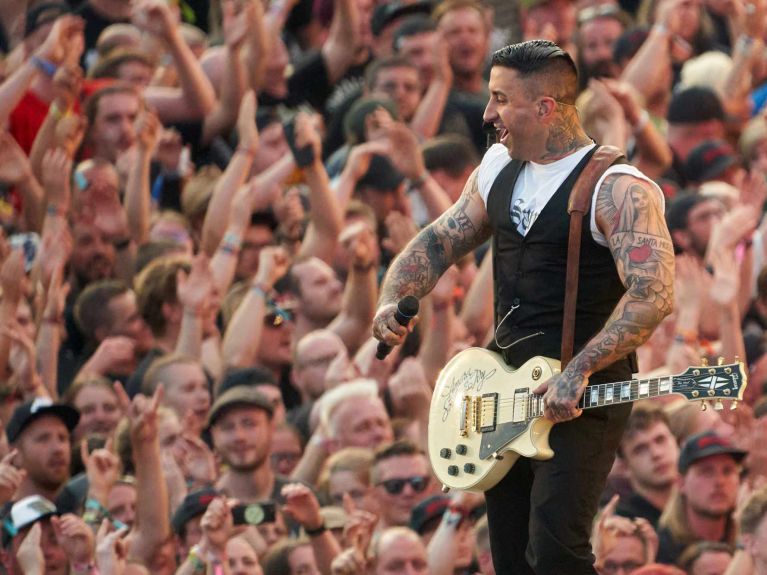 Sammy Amara from the Broilers performing for 90,000 fans at the Nürburgring