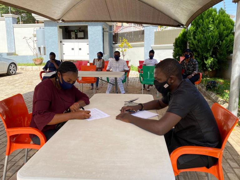 Lagos: outdoor consultation about the coronavirus pandemic.