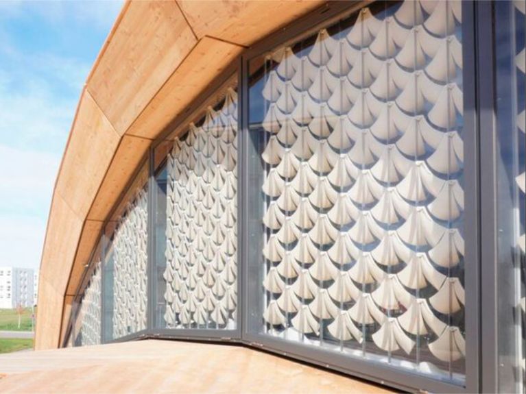 Facade system inspired by pine cones Facade system inspired by pine cones