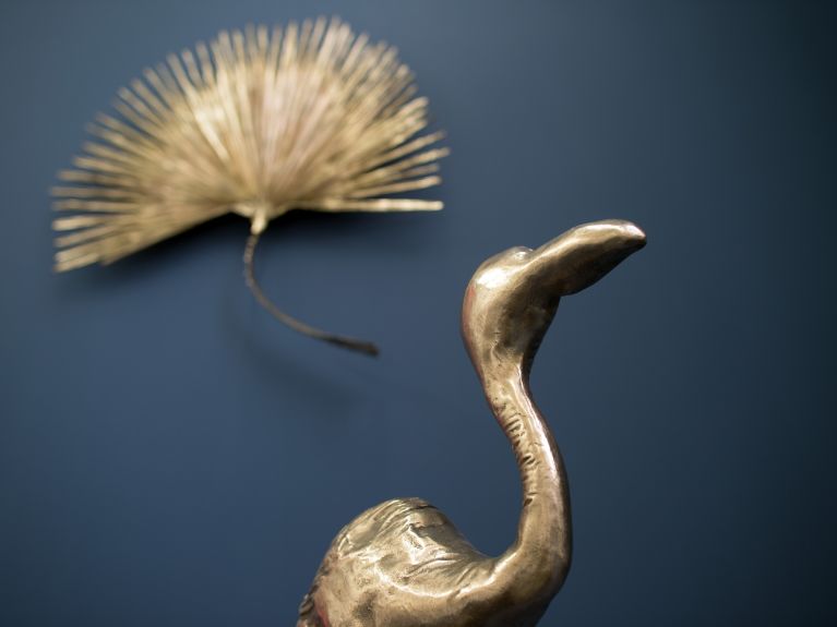 Fächer und Vogel aus Bronze
