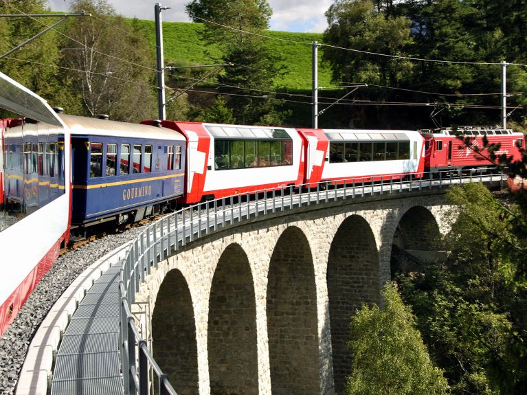 Through valleys and through mountains, but always on time: the Swiss railway