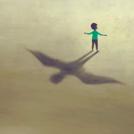Farbisslustration eines kleinen Jungen, dessen Schatten mit großen Flügeln dargestellt ist.n 