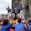 Menschenturmbauer aus Barcelona feiern im Jahr 2022 in Köln die Verbindung zwischen der spanischen und der deutschen Stadt.