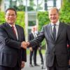 Bundeskanzler Scholz in China 2022 mit Ministerpräsident Li Qiang