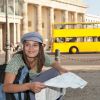 Tourist looking at Berlin city map