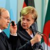 German Chancellor Angela Merkel and Algerian President Abdelaziz Bouteflika