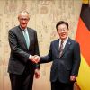 Friedrich Merz und Lee Jae-myung