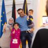 Familie aus Irak bei Einbürgerungsfeier  